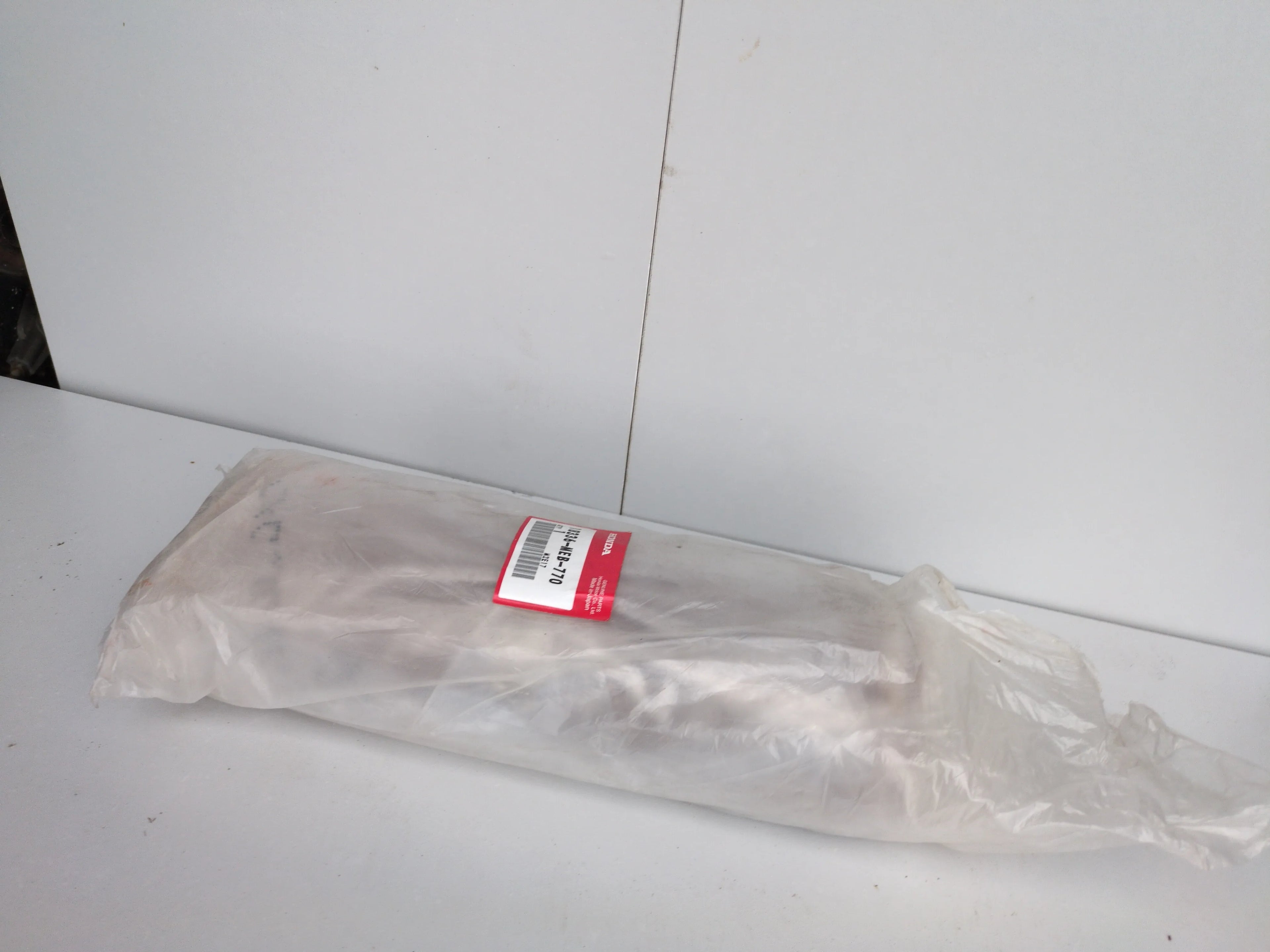 Honda XL1000V Varadero Exhaust Baffle – Right Side (OEM 18336-MEB-770) – Genuine Honda NOS Original Part