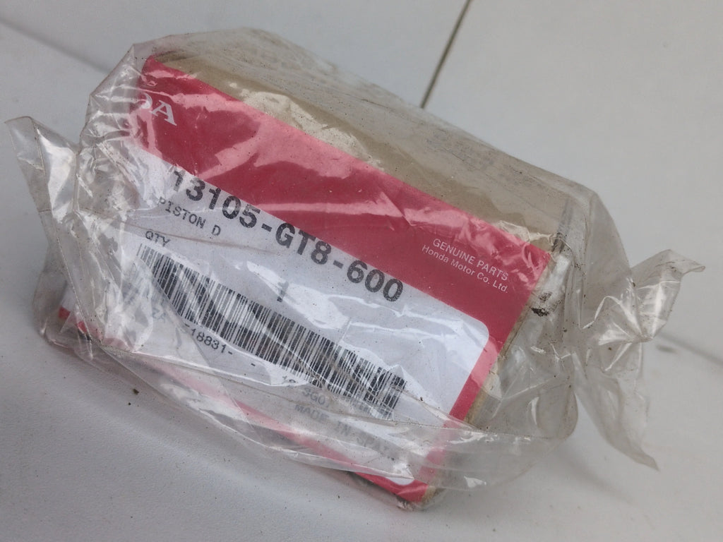 Honda Vision 50 Piston (1986-1993) – Genuine OEM 13105-GF8-600 – Made in Japan – NOS Original Honda Part