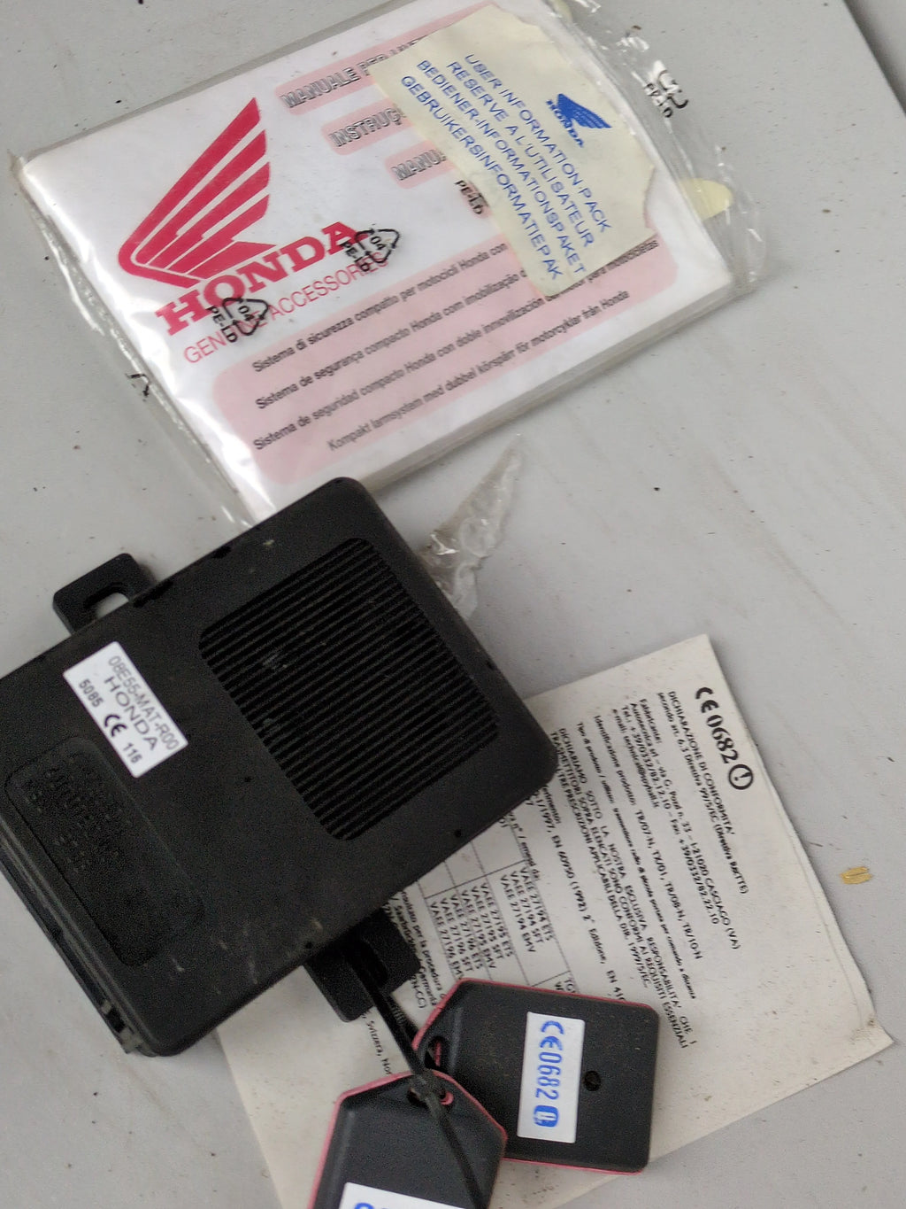  Honda Genuine Alarm Kit 08E55-MAT-R00 OEM NOS Motorcycle Security System with Remote Controls from ExoticParts