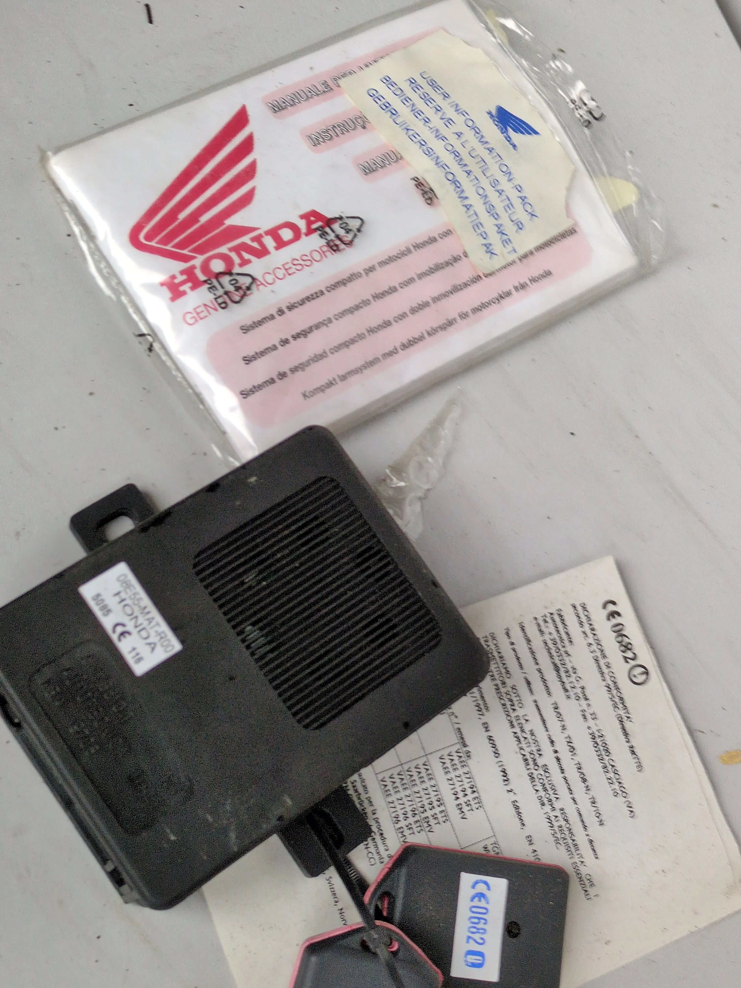 Honda Genuine Alarm Kit 08E55-MAT-R00 OEM NOS Motorcycle Security System with Remote Controls from ExoticParts