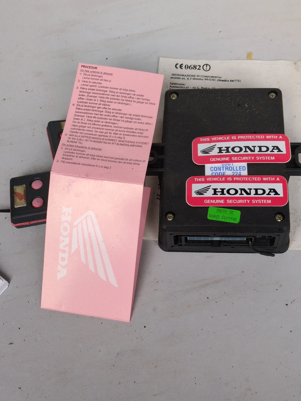 Honda Genuine Alarm Kit 08E55-MAT-R00 OEM NOS Motorcycle Security System with Remote Controls from ExoticParts
